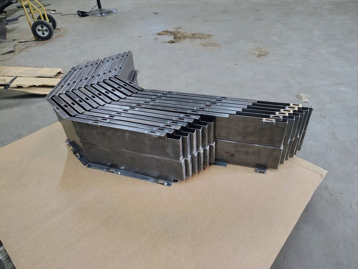 Custom-formed fender flares for a Moke electric vehicle